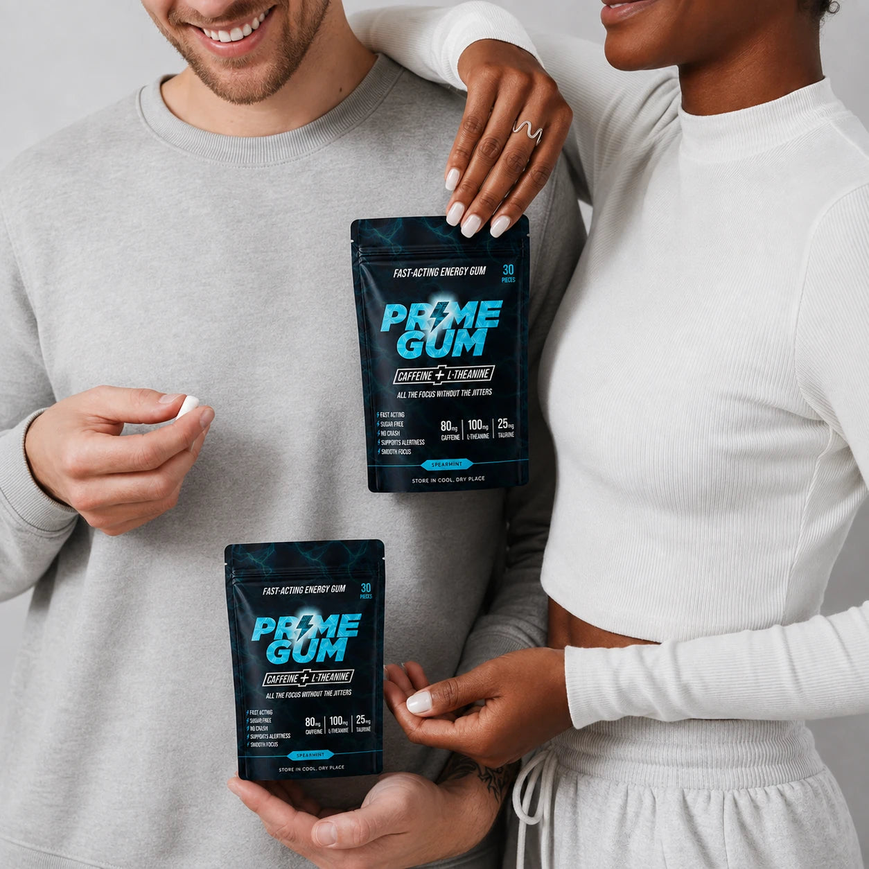 Two people holding Prime Gum